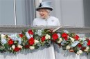 Britain's Queen Elizabeth smiles as she attends the Epsom Derby, in Epsom, south of London