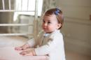 In this undated handout photo released on Sunday, May 1, 2016 by Kensington Palace, Britain's Princess Charlotte poses for a photograph, at Anmer Hall, in Norfolk, England. The princess will celebrate her first birthday on Monday. (Kate, the Duchess of Cambridge/Kensington Palace via AP)