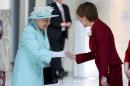 Britain's Queen Elizabeth meets First Minister and SNP leader Nicola Sturgeon as she attends the opening of the fifth session of the Scottish Parliament in Edinburgh