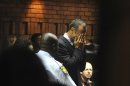 File: Athlete Oscar Pistorius weeps in court in this Friday, Feb 15, 2013, file photo at his bail hearing in the murder case of his girlfriend Reeva Steenkamp. It is reported Sunday Aug. 18, 2013, that the trial of Pistorius will be in early 2014 but the exact date will likely be set in court on upcoming Monday, according to prosecutors. (AP Photo/Antione de Ras - Independent Newspapers Ltd South Africa) SOUTH AFRICA OUT