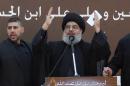 A file picture taken on November 14, 2013 shows the head of Lebanon's militant Shiite Muslim movement Hezbollah, Hassan Nasrallah giving a speech during a massive Shiite Muslim commemoration in southern Beirut