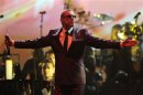 British singer George Michael performs on stage during his "Symphonica" tour concert in Vienna