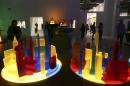 People view art pieces based on the bottle city of Kandor during an exhibition of work by late artist Mike Kelley during a media preview at The Geffen Contemporary at MOCA in Los Angeles