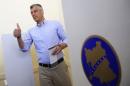 Kosovo's PM Thaci gestures at the polling station in Pristina