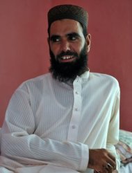 Pakistani cleric Hafiz Khalid Chishti, the Imam of a local mosque, looking on during an interview with AFP in Mehrabad, a suburb of the capital Islamabad on August 24. Pakistani police have arrested the cleric on suspicion of planting evidence against a Christian girl accused of blasphemy