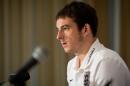 England football squad member Leighton Baines speak to journalists during a press conference at the Grange Hotel near Watford, England, on October 13, 2013