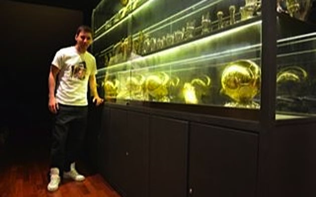 This Is Lionel Messi with His Giant Trophy Cabinet