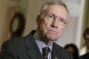 Senate Majority Leader Harry Reid, D-Nev., speaks to reporters after a Democratic caucus lunch, at the Capitol in Washington, Tuesday, May 13, 2014. (AP Photo)