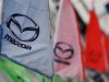 Logos of Mazda Motor Corp are seen at a dealership in Tokyo