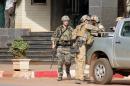 French special forces stand guard outside the Radisson Blu hotel in Bamako on November 20, 2015, after it was beseiged by jihadists