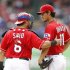 Texas Rangers starting pitcher Yu Darvish and catcher Geovany Soto talk on the mound in Arlington, Texas