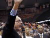 Syracuse coach Jim Boeheim acknowledges the crowd as Detroit Mayor Dave Bing, right, watches after Syracuse defeated Detroit 72-68 for Boeheim's 900th career victory in an NCAA college basketball game in Syracuse, N.Y., Monday, Dec. 17, 2012. Bing and Boeheim were roommates and teammates in college. (AP Photo/Kevin Rivoli)