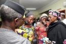 Some of the 21 Chibok school girls released are seen during a meeting with Nigeria's Vice President Yemi Osinbajo in Abuja, Nigeria