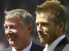 File photo of Manchester United's David Beckham standing with manager Sir Alex Ferguson before their match against Charlton Athletic in the English premier league match at Old Trafford
