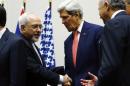 U.S. Secretary of State Kerry shakes hands with Iranian Foreign Minister Zarif after a ceremony at the United Nations in Geneva