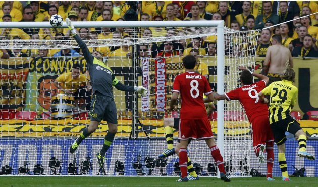 Borussia Dortmund's goalkeeper Zlatan Alomerovic saves a shot by Bayern Munich's Mario Mandzukic during their Champions League Final soccer match at Wembley Stadium in London