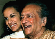 FILE - In this Dec. 19, 2002, Indian Sitar maestro Ravi Shankar, right, and daughter Anoushka Shankar smile during a press conference in Calcutta, India. Shankar, the sitar virtuoso who became a hippie musical icon of the 1960s after hobnobbing with the Beatles and who introduced traditional Indian ragas to Western audiences over an eight-decade career, has died. He was 92. (AP Photo/Bikas Das, File)