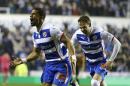 Reading's Garath McCleary, left, celebrates with Chris Gunter after he scores a goal during the English FA Cup sixth round replay soccer match between Reading and Bradford City at the Madejski stadium in Reading, England, Monday, March 16, 2015. (AP Photo/Kirsty Wigglesworth)