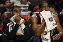 Atlanta Hawks' Teague and Horford look on from the bench during the second half of their NBA basketball game against the Chicago Bulls in Chicago