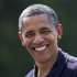 President Barack Obama smiles as he returns to the White House in Washington, Sunday, July 8, 2012, from Camp David, Md.  (AP Photo/Manuel Balce Ceneta)