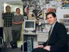 FILE - In this Friday, Feb. 26, 1999, file photo, Michael Dell, foreground, sits in the dorm room at the University of Texas in Austin, Texas, where he launched his enterprise as a college freshman. Michael Dell was the Mark Zuckerberg of his time. Hailed as a young genius, he created the inexpensive, made-to-order personal computer in his dorm room and peddled it to the masses. (AP Photo/Harry Cabluck, File)
