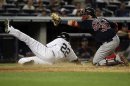 Boston Red Sox catcher Jarrod Saltalamacchia, right, tags out New York Yankees' Andruw Jones at home plate during the eighth inning of a baseball game at Yankee Stadium in New York, Friday, July 27, 2012. The Yankees defeated the Red Sox 10-3. (AP Photo/Seth Wenig)