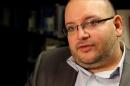 A November 6, 2013 photo provided by the Washington Post shows reporter Jason Rezaian at the newspaper's office in Washington