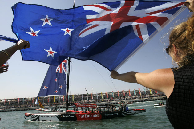 A supporter of New Zealand waves a flag. (AP Photo/Bernat Armangue)