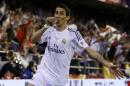 File picture taken on April 16, 2014 shows Argentina midfielder Angel di Maria celebrating after scoring for Real Madrid during the Spanish Copa del Rey final against Barcelona at the Mestalla Stadium in Valencia