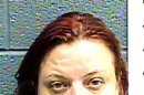 This image provided Jan. 25, 2013 by the Las Cruces Police Department, shows Cindy Patriarchias, 33, following her arrest for child abuse. Police say she and her boyfriend locked up an 8-year-old girl with developmental disabilities in a wooden cage, then left her alone while they headed out to watch a movie. (AP Photos/Las Cruces Police Department)