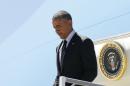 U.S. President Obama disembarks from Air Force One as he arrives at Los Angeles International Airport