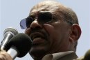 Sudanese President Omar Hassan al-Bashir gives a speech as he tours the White Nile Sugar Co sugar plant during its opening in Al-Diwaim