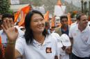 Peruvian presidential candidate Keiko Fujimori of the Fuerza Popular (Popular Force) party greets supporters during a campaign rally in San Juan de Lurigancho