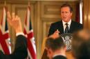 Britain's Prime Minister David Cameron answers questions