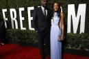 Elba and Harris pose at the premiere of "Mandela: Long Walk to Freedom" in Los Angeles