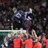 Paris Saint Germain's midfielder David Beckham from England, is thrown in the air by his teammate at the end of their French League One soccer match against Brest, at the Parc des Princes stadium, in Paris, Saturday, May 18, 2013. Paris Saint-Germain hopes to strike a deal with David Beckham in the next two weeks in which the former England captain will work with the French club after retirement, possibly in an ambassadorial role. (AP Photo/Thibault Camus)