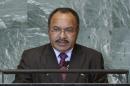 FILE - In this Sept. 24, 2011 file photo, Papua New Guinea's Prime Minister Peter O'Neill addresses the 66th session of the United Nations General Assembly at U.N. headquarters in New York. O'Neill was served with an arrest warrant on Monday in relation to a fraud case by the country's anti-corruption body, Australian Broadcasting Corp. reported. Neither O'Neill's office nor a police spokesman could be immediately contacted for comment Monday, June 16, 2014. (AP Photo/Mary Altaffer, File)