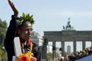 Florence Kiplagat of Kenya celebrates after the 38th Berlin Marathon on September 25, 2011 in Berlin