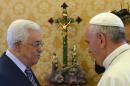 Pope Francis (right) talks with Palestinian president Mahmud Abbas during a private audience at the Vatican, on October 17, 2013