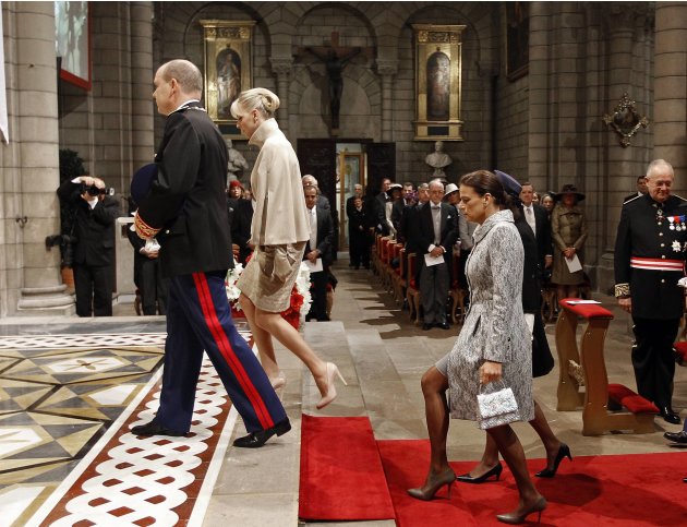 Prince Albert II of Monaco, Princess Charlene and his sister Princess Stephanie arrive in Monaco cathedral to attend a mass for Monaco's National Day in Monte Carlo