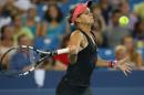 Jana Cepelova of Slovakia returns a shot on August 12, 2013 at Lindner Family Tennis Center in Cincinnati, Ohio