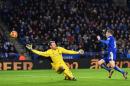 Leicester City's striker Jamie Vardy (R) shoots to score his second goal past Liverpool's goalkeeper Simon Mignolet at King Power Stadium in Leicester, central England on February 2, 2016