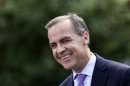 The Governor of the Bank of England, Mark Carney, smiles during a television interview after a presentation for the concept design for the Bank of England's new ten pound banknote, at the Jane Austen House Museum in Chawton