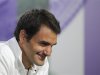 Roger Federer of Switzerland speaks at a news conference the day before the start of the Wimbledon Tennis Championships, in London