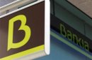 The logo of Spain's Bankia bank is seen on a wall of one of its branches in Madrid