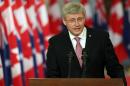 Canadian Prime Minister Stephen Harper addresses media in Ottawa on June 9, 2014