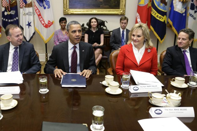 President Barack Obama, flanked by National Governors Association (NGA) Chairman, Delaware Gov. Jack Markell, left, and NGA Vice Chair, Oklahoma Gov. Mary Fallin, meets with the NGA executive committee regarding the fiscal cliff, Tuesday, Dec. 4, 2012, in the Roosevelt Room at the White House in Washington. Treasury Secretary Tim Geithner is at right. (AP Photo/Charles Dharapak)