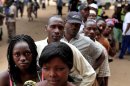 Angolans queue at a voting station in Kicolo, Luanda, Angola to cast their ballots Friday, Aug. 31, 2012. Victory for the Popular Movement for the Liberation of Angola, (MPLA) would give Angola's ruler for 33 years , President Jose Eduardo dos Santos, another five-year term. (AP Photo)