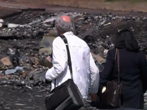 Family of MH17 Victim Pay Respects at Crash Site