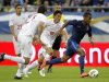 France's Florent Malouda runs with the ball as Serbia's Ljubomir Fejsa challenges during their international friendly soccer match at Auguste Delaune's stadium in Reims
